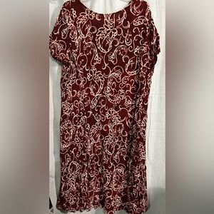 Woman Within. Maroon dress with white design
